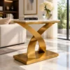 Gold X base marble console table beside cream sofa in modern living room