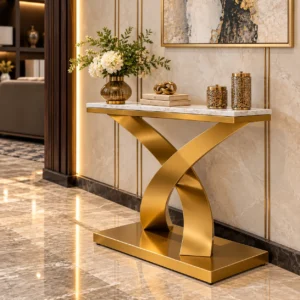 Luxury marble console table with curved gold pedestal in elegant entryway