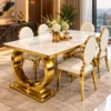 Modern white marble dining table set with gold oval back chairs