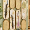 Decorative peacock room partition with floral artwork and woven oval panels