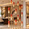 Decorative gold room divider with colorful marble beads