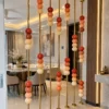 Floor to ceiling stainless steel partition with marble beads