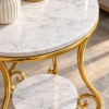 Close-up of white marble tabletop and lower marble shelf on gold scrollwork side table