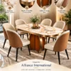 Orvella Luxe oval marble dining table set with gold-veined white marble top, sculptural pedestal and upholstered chairs.