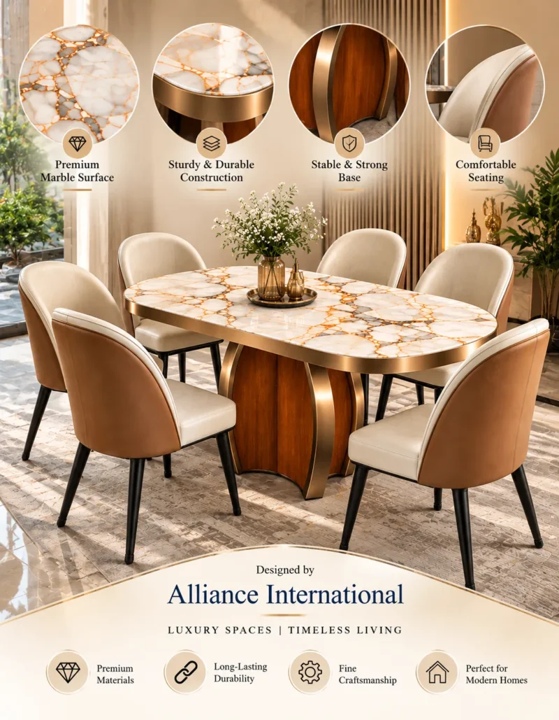 Orvella Luxe oval marble dining table set with gold-veined white marble top, sculptural pedestal and upholstered chairs.