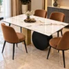 4 seater white marble dining table with sculptural disc base