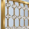 Close-up of clear faceted beads and gold stainless steel partition frame