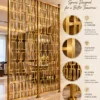 Rectara Luxe geometric metal partition showing stainless steel frame pattern and floor supports