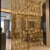 Rectara Luxe gold stainless steel room divider in modern luxury interior