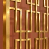 Close view of Rectara Luxe gold stainless steel rectangular partition pattern