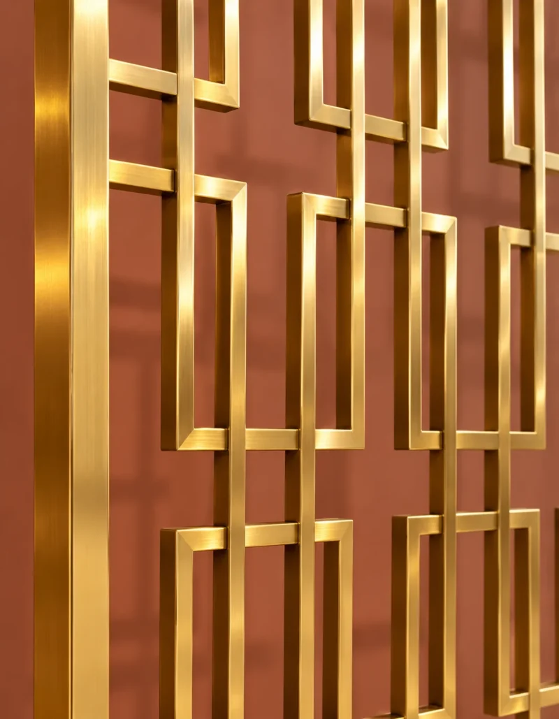 Close view of Rectara Luxe gold stainless steel rectangular partition pattern