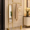 Solvane entryway mirror with coat rack holding scarf and handbag