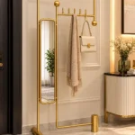 Solvane entryway mirror with coat rack holding scarf and handbag