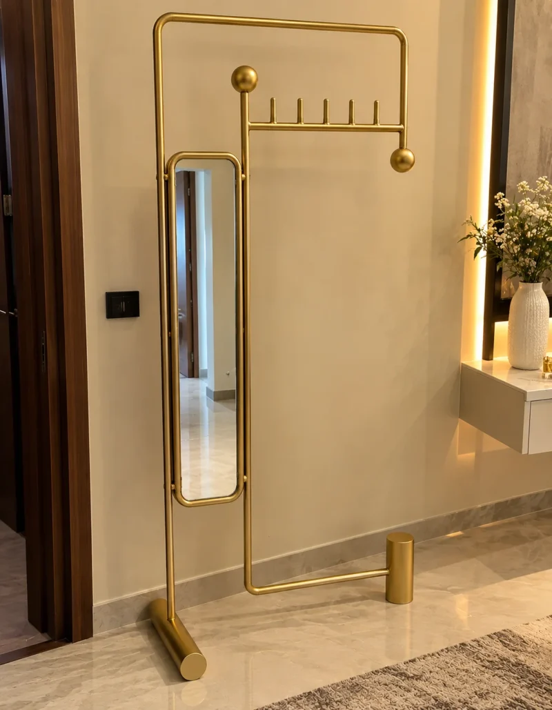 Solvane gold standing mirror with coat rack in modern entryway