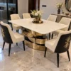 Luxury white marble dining table with gold spiral base and chairs