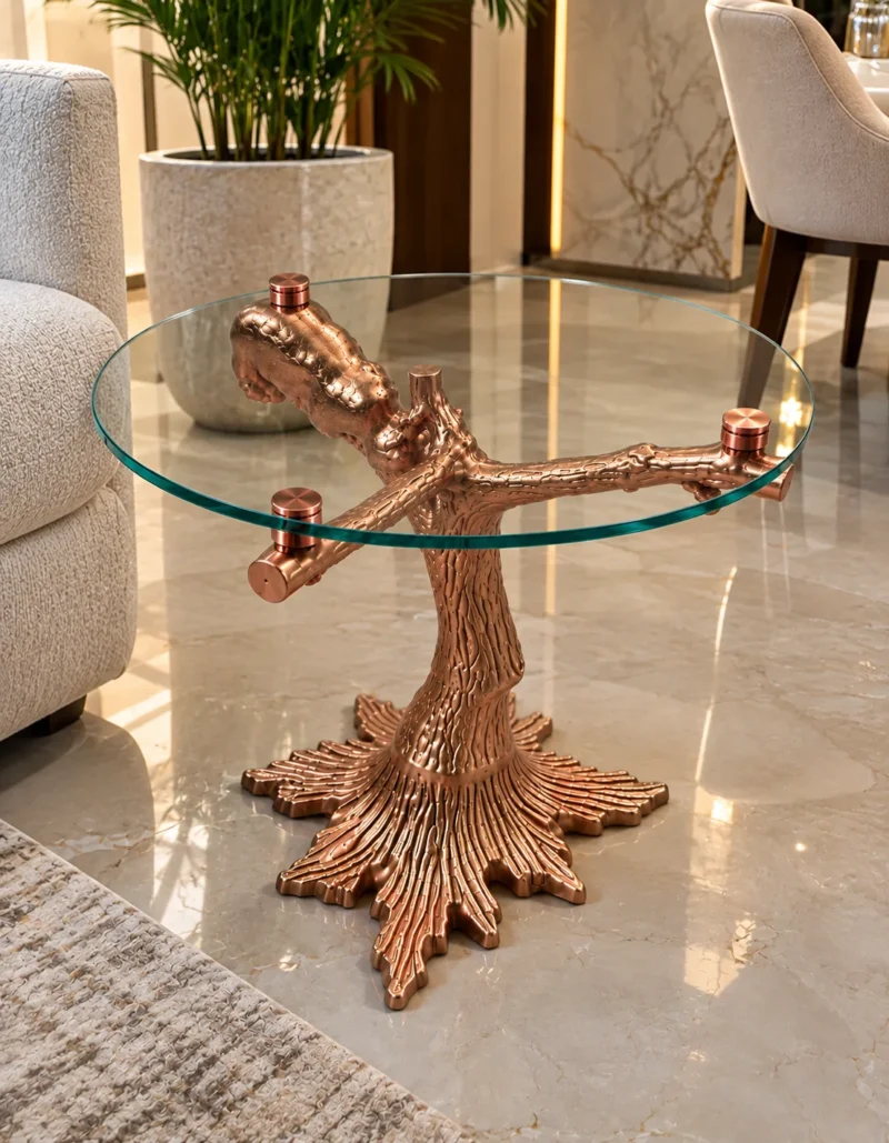 Luxury glass side table with rose gold tree trunk pedestal, decorative bear and spreading root-shaped base