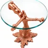 Sylvara Luxe rose gold tree branch glass side table with resting bear sculpture and textured root pedestal on white background