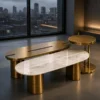 Gold stainless steel and marble centre table set in modern interior