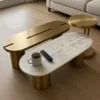 Trivora marble centre table set styled with coffee mug in living room