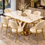 6 seater marble dining table with geometric gold stainless steel base