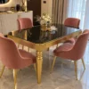 Black marble dining table with gold stainless steel legs and chairs