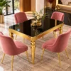 Luxury black marble dining table set with four pink chairs