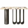 Velora Luxe loop console table with veined white marble top, cylindrical stainless steel pedestal and three U-shaped supports on white background.
