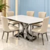 Square white marble dining table with six ivory upholstered chairs and dark stainless steel pedestal against a pale blue interior wall.