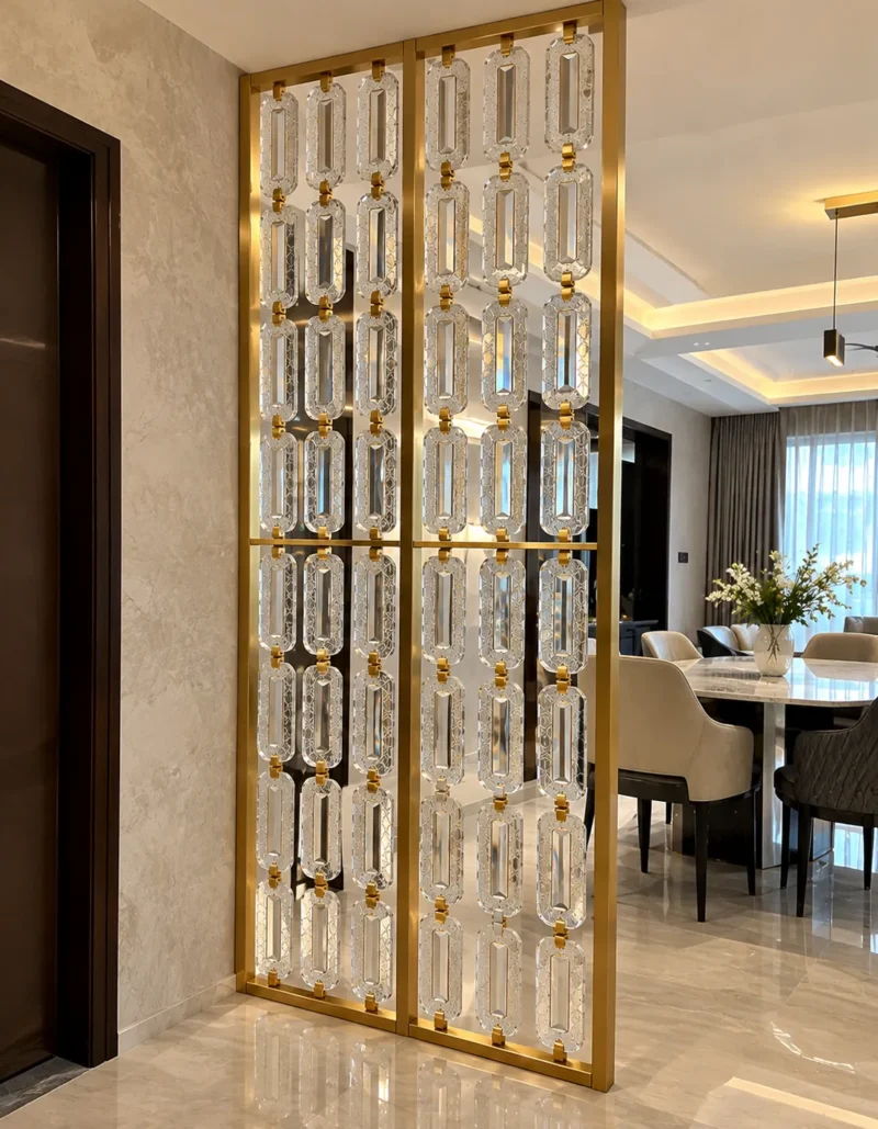 Gold stainless steel partition with linked Premix Glas beside a luxury dining room