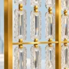 Close-up of textured Premix Glas links and gold connectors on room partition