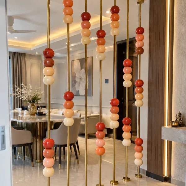Floor to ceiling stainless steel partition with marble beads