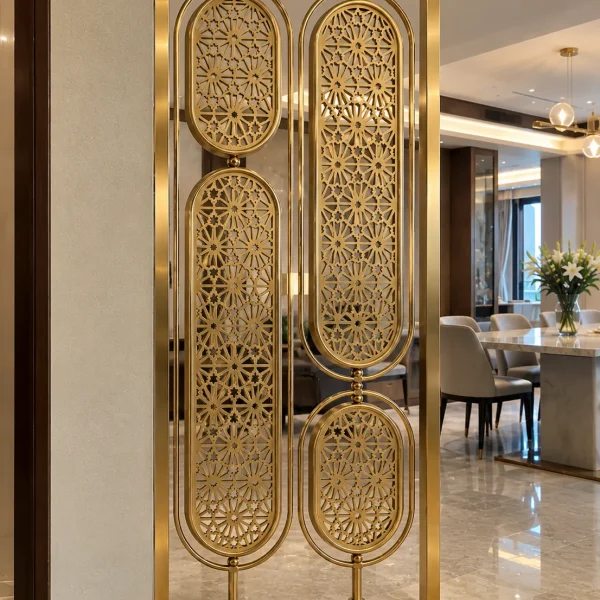 Modern gold room divider with four oval floral panels beside dining room